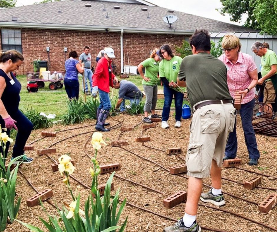 Photo of Master Gardeners installing drip irrigation.